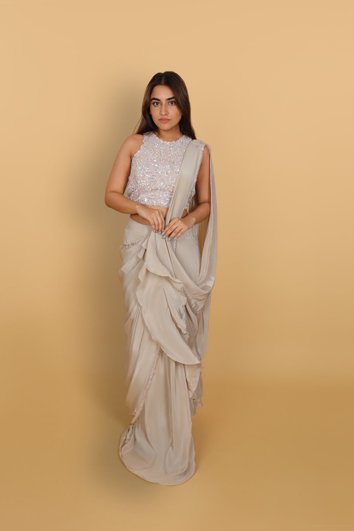 Metallic drape saree with halter-neck blouse