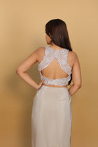 Metallic drape saree with halter-neck blouse