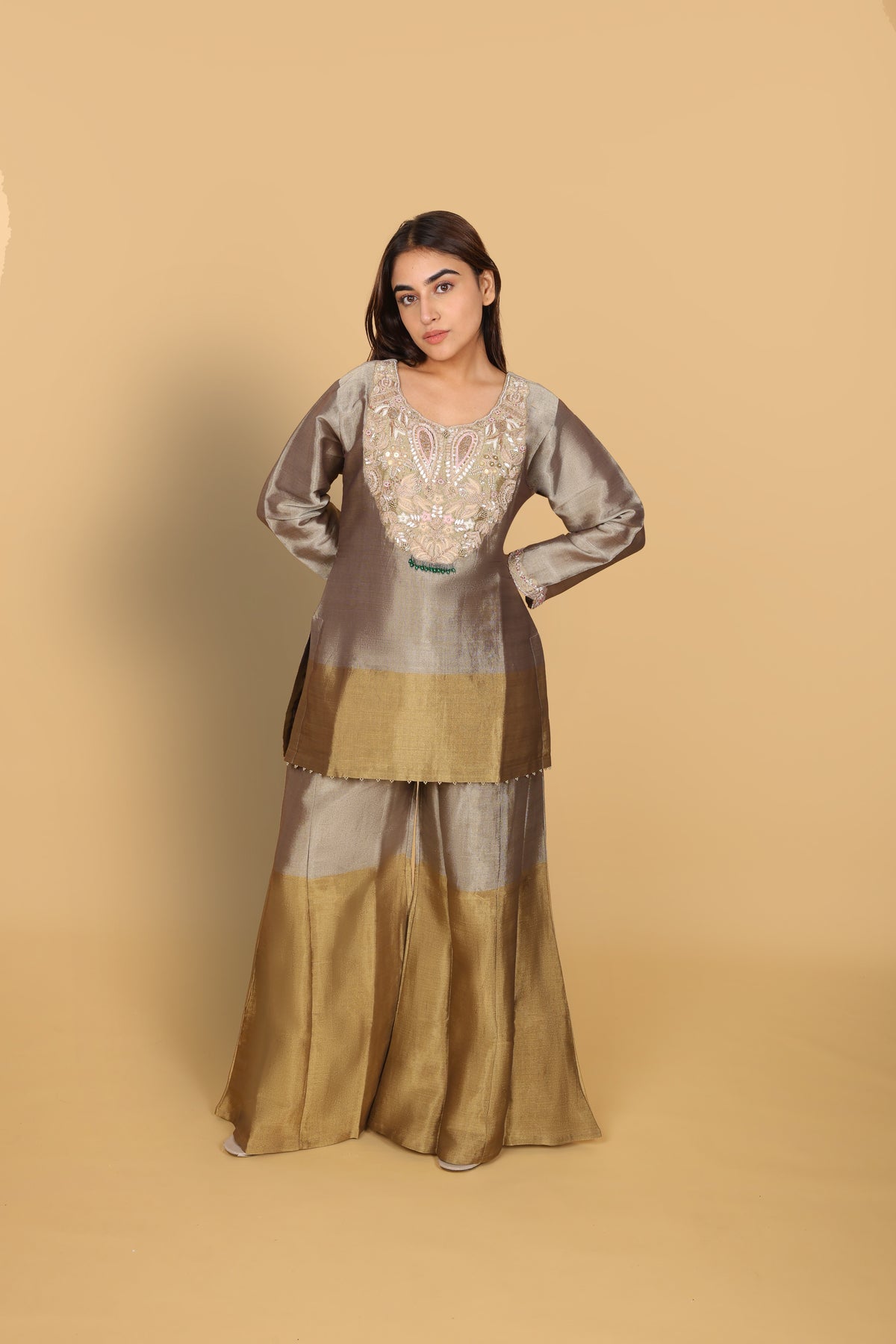 Gold-shaded co-ord set with top and bell-bottom pants