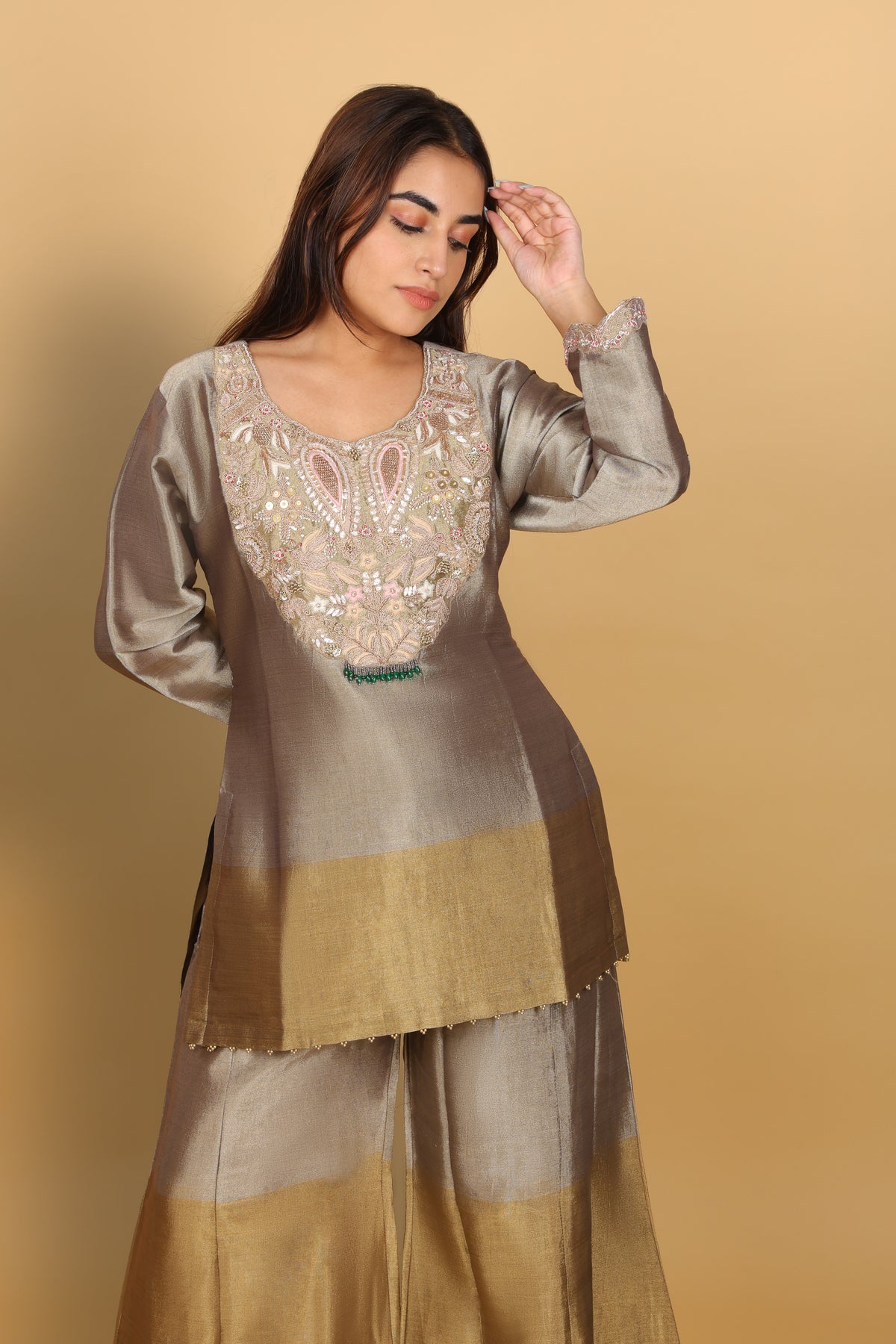 Gold-shaded co-ord set with top and bell-bottom pants
