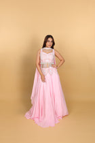 Baby-pink Indo-Western lehenga with peplum top and necklace-style dupatta