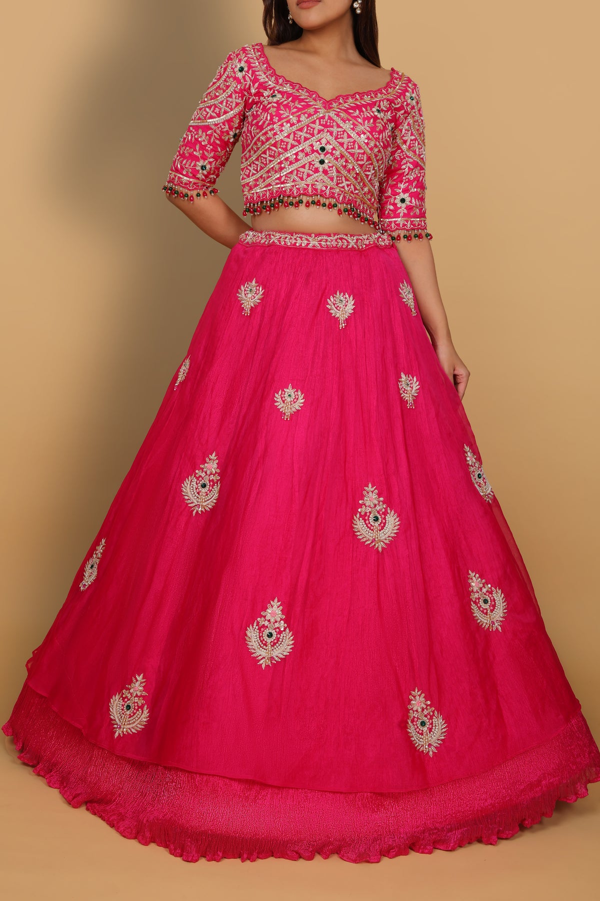 Rani umbrella lehenga with embellished blouse and hanging bead details