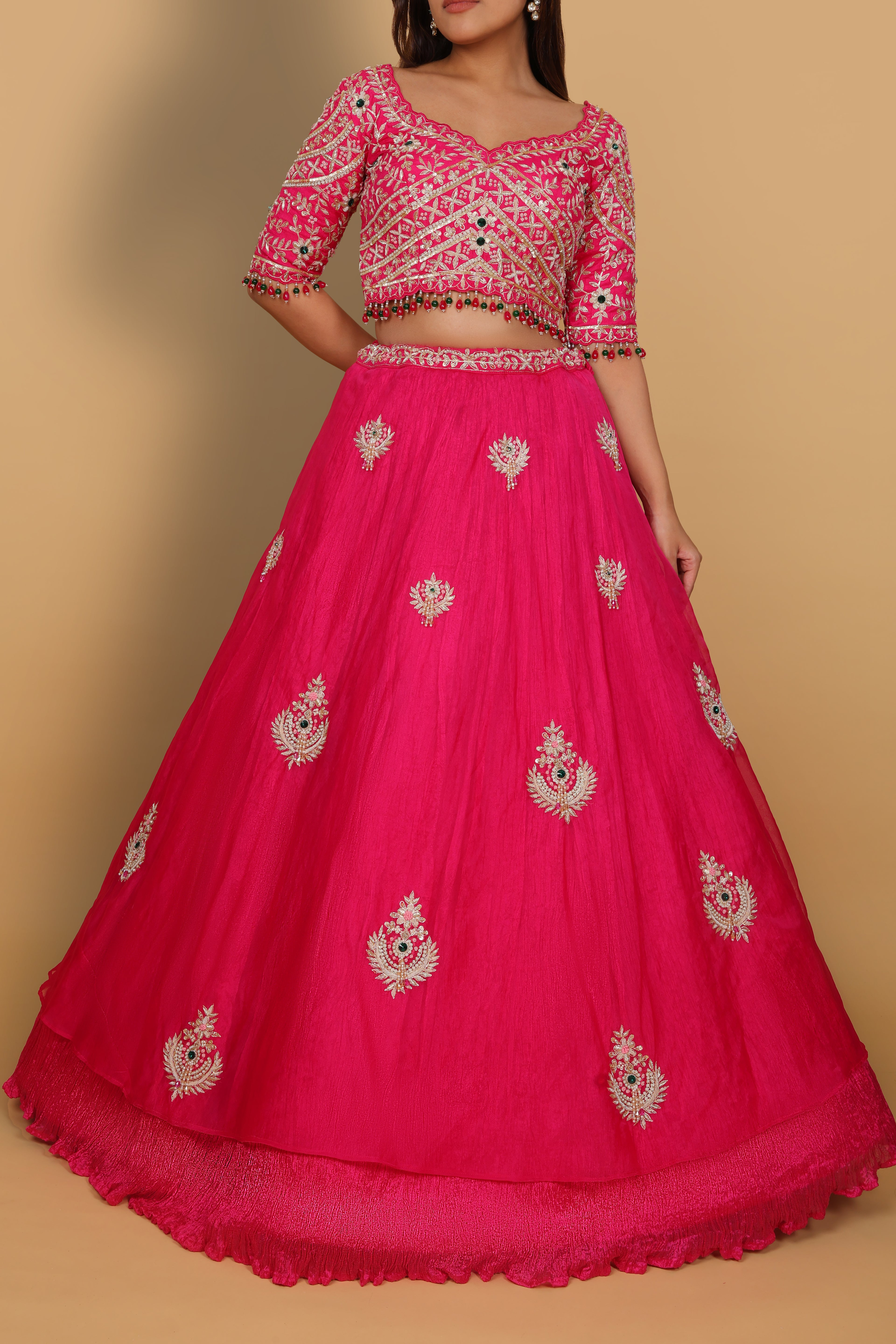 Rani umbrella lehenga with embellished blouse and hanging bead details