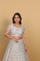 Ivory lehenga kali concept, spaghetti blouse with dolls self-on-self
