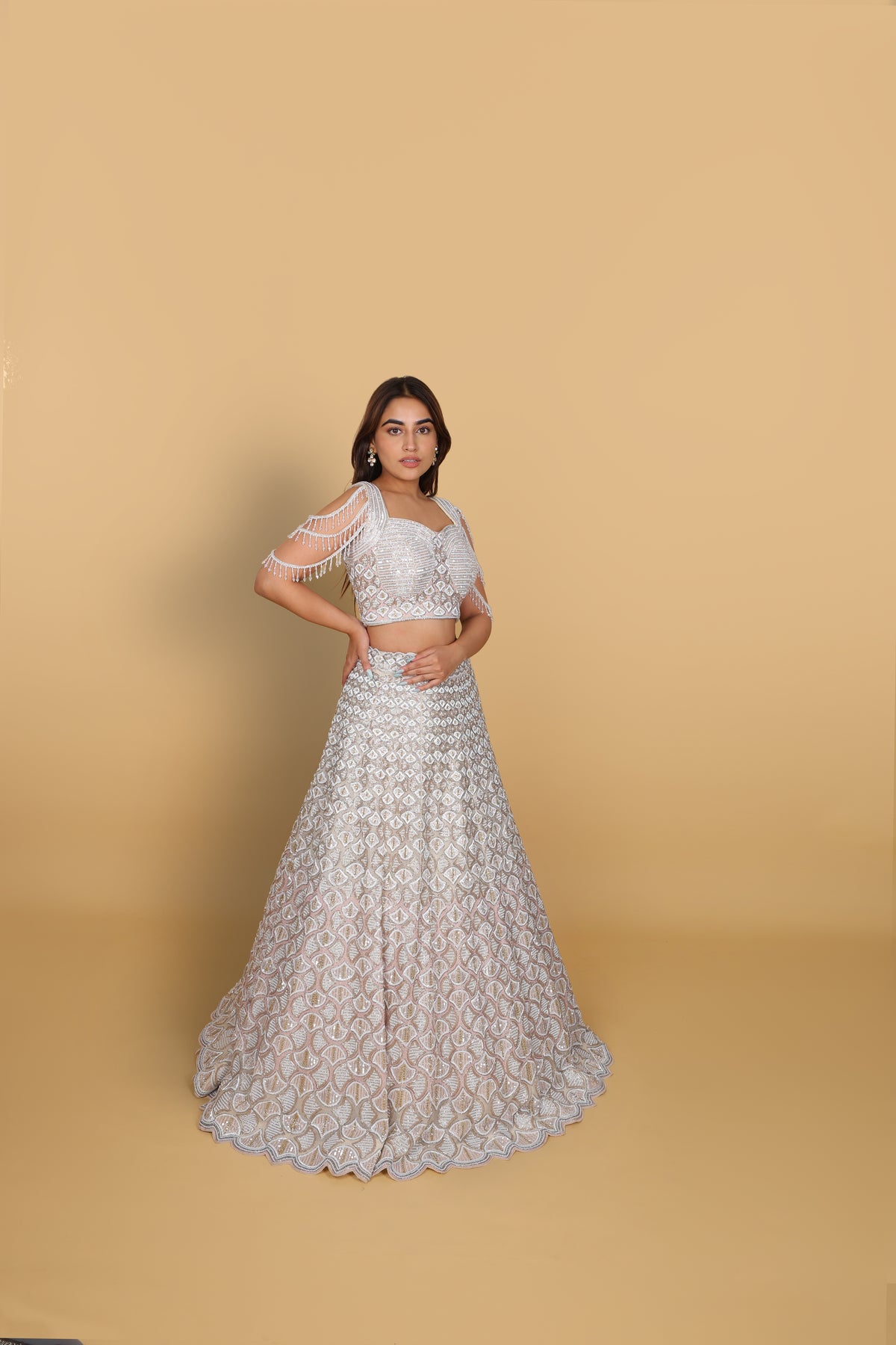 Ivory lehenga kali concept, spaghetti blouse with dolls self-on-self