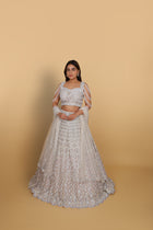 Ivory lehenga kali concept, spaghetti blouse with dolls self-on-self