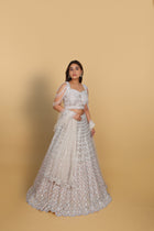 Ivory lehenga kali concept, spaghetti blouse with dolls self-on-self