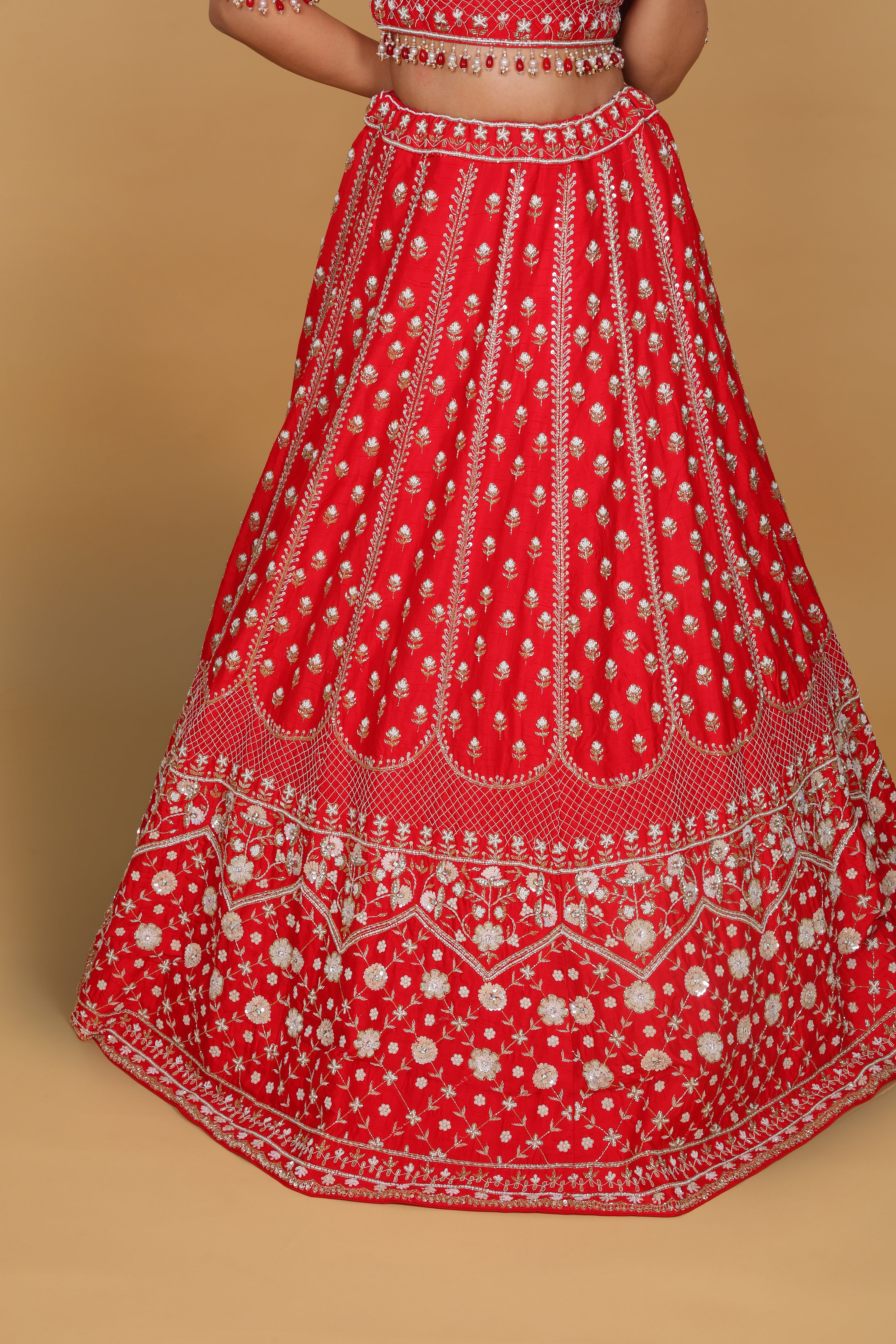 Red lehenga Sabyasachi-cut blouse, two dupattas (self and contrast)