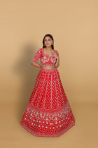 Red lehenga Sabyasachi-cut blouse, two dupattas (self and contrast)