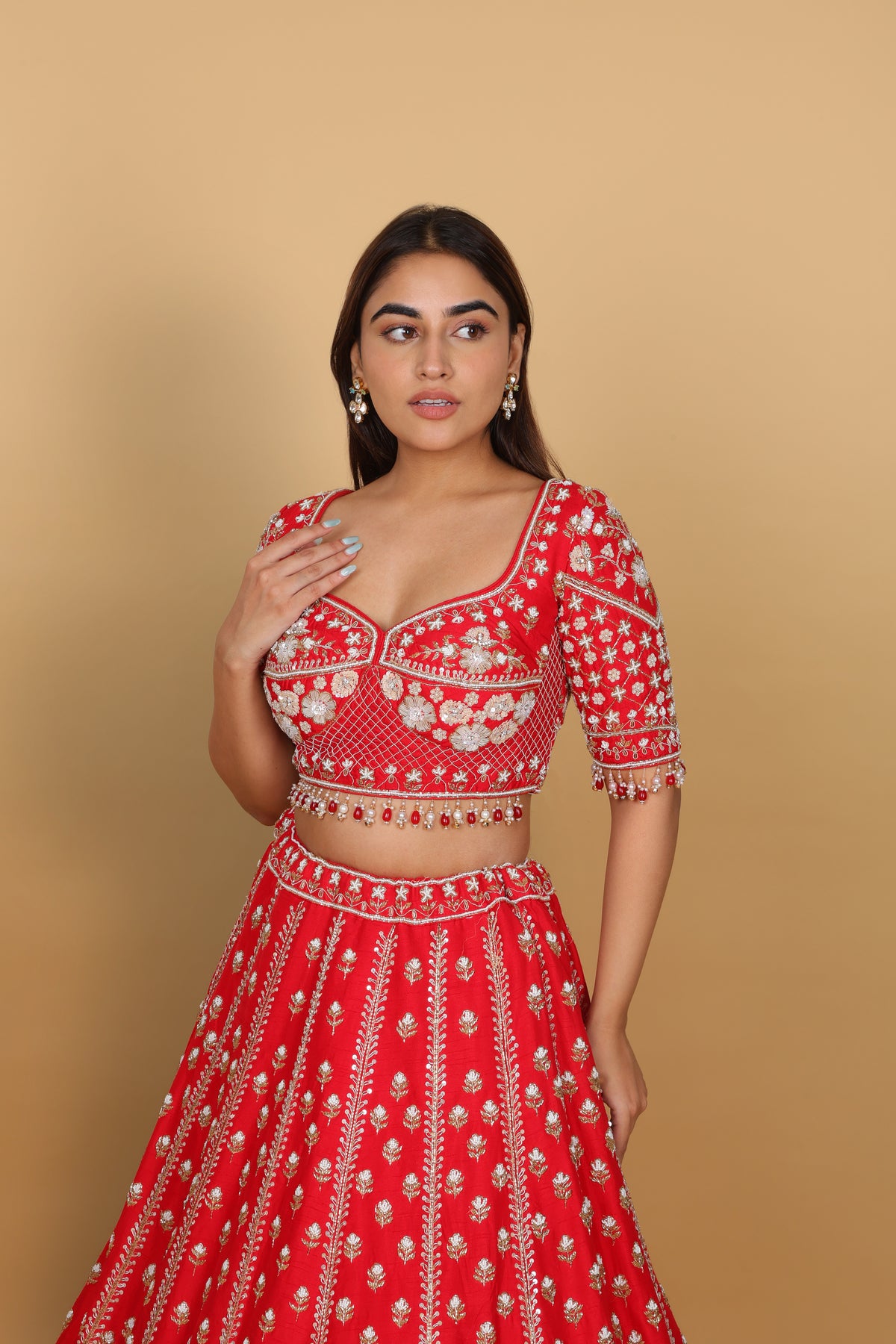 Red lehenga Sabyasachi-cut blouse, two dupattas (self and contrast)