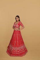 Red lehenga Sabyasachi-cut blouse, two dupattas (self and contrast)