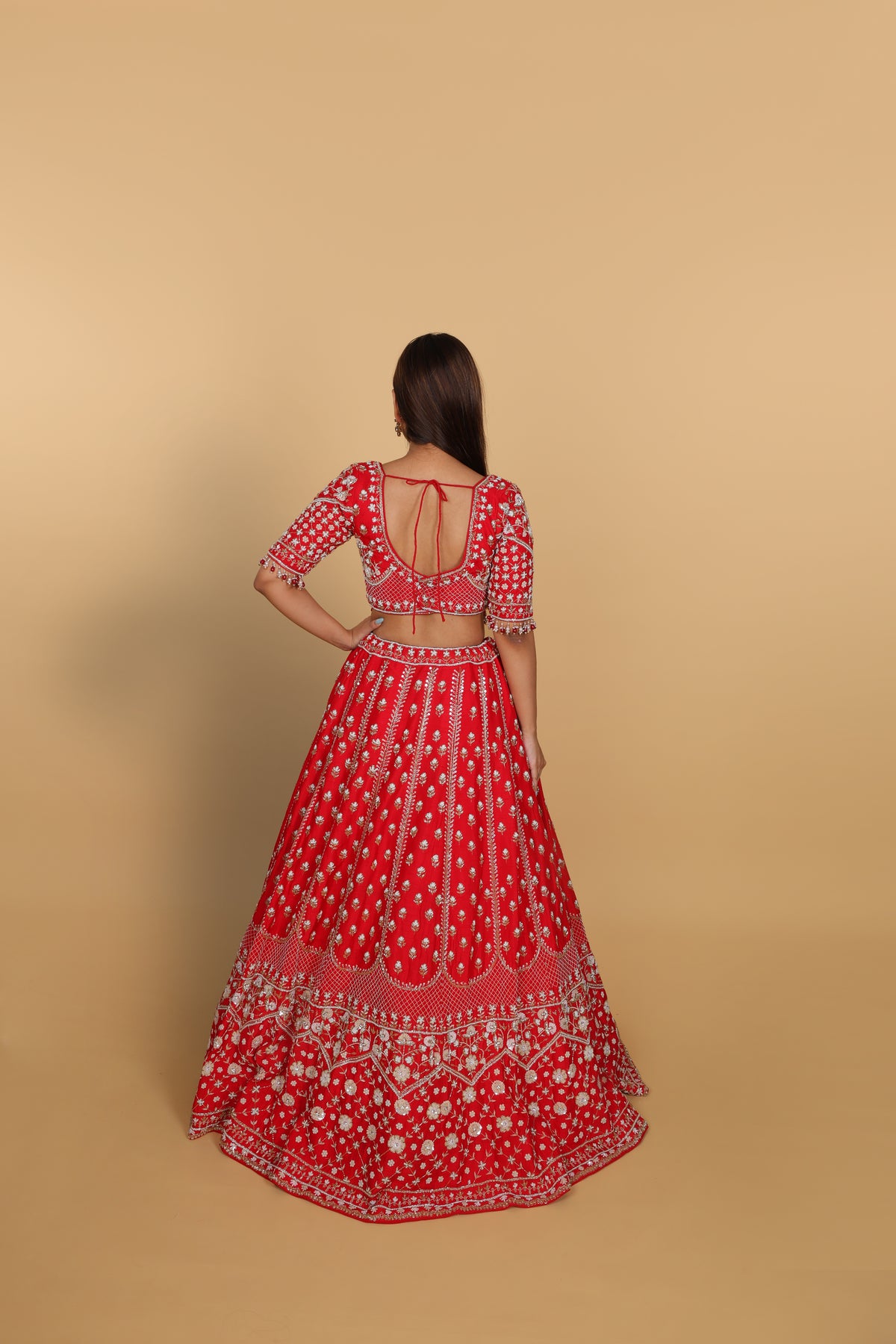 Red lehenga Sabyasachi-cut blouse, two dupattas (self and contrast)