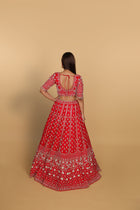 Red lehenga Sabyasachi-cut blouse, two dupattas (self and contrast)