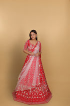 Red lehenga Sabyasachi-cut blouse, two dupattas (self and contrast)